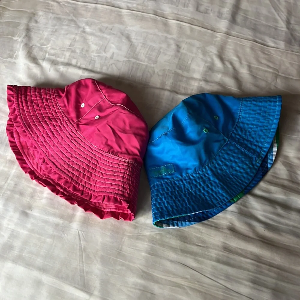 UV Skinz kids fuchsia and blue bucket hats in size 6 and 7